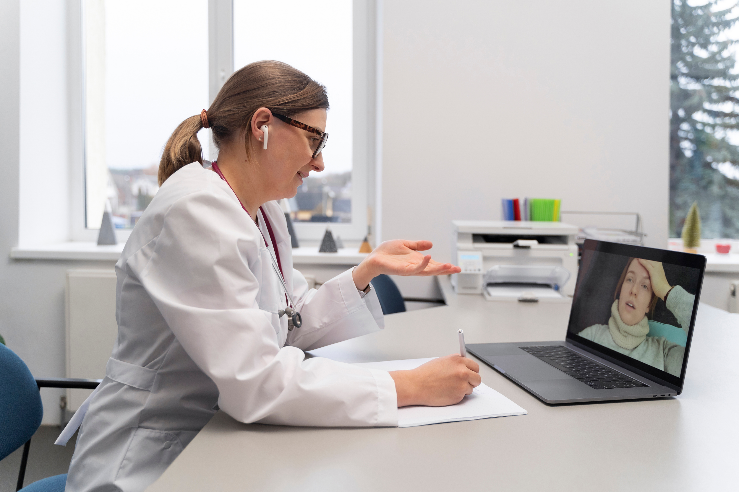 What A Medical Virtual Assistants Can Do For Your Practice 1 Medical Virtual Assistants Providing Remote Support To A Healthcare Practice Via Laptop.